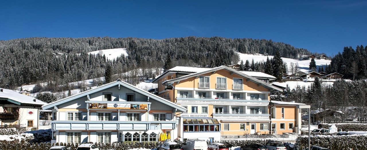 Außenansicht Winter - Das 3-Sterne Hotel Brückenwirt in Altenmarkt Zauchensee im Salzburger Land